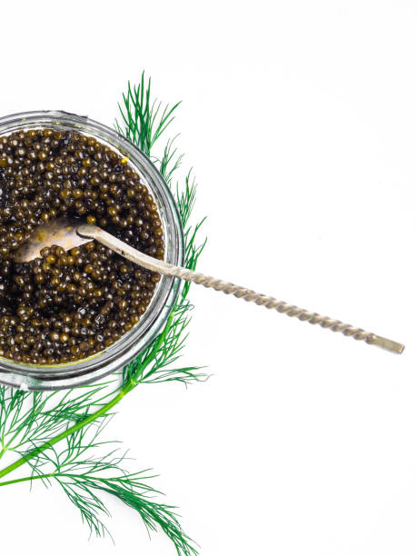 istock black caviar vintage silver spoon on white background 1149426929