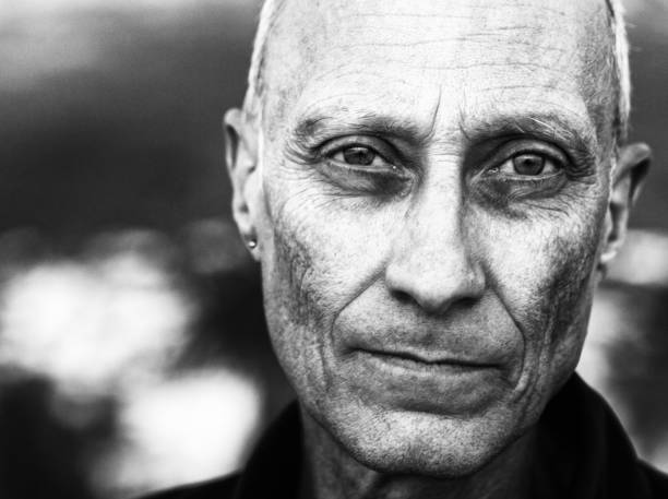 istock Ominous looking senior man stares at camera 1149428653
