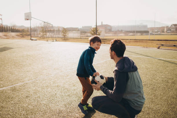 istock Soccer players 1149428675