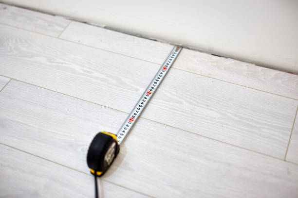 istock Tape measure for home renovation and laminate flooring. 1149428995