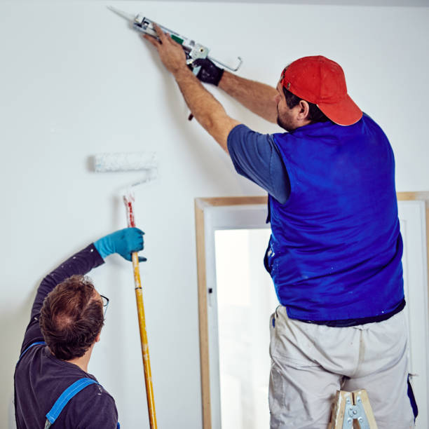 istock Two handymen working together on a house renovation. 1149429220