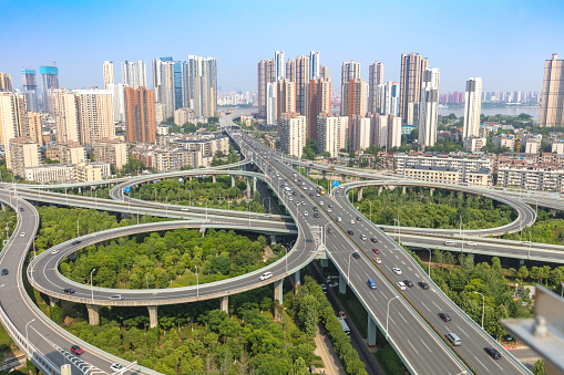city highway interchange with blue sky, aerial view of modern traffic background.Wuhan, the largest transportation and economic hub city in central China.