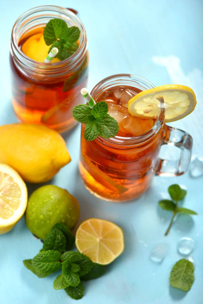 istock Iced tea with lemons, limes and mint with ice cubes, summer refreshment drink 1149433410