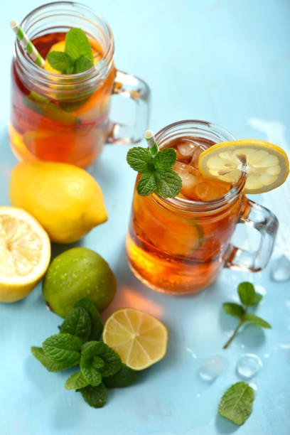 istock Iced tea with lemons, limes and mint with ice cubes, summer refreshment drink 1149433418