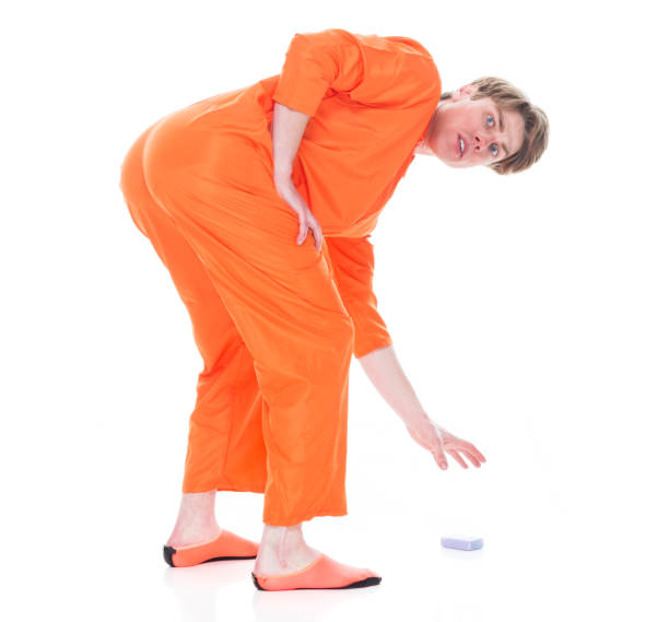 istock Male prisoner picking up dropped soap 1149435427