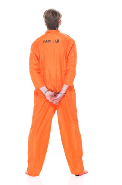istock Male prisoner wearing handcuffs 1149435511