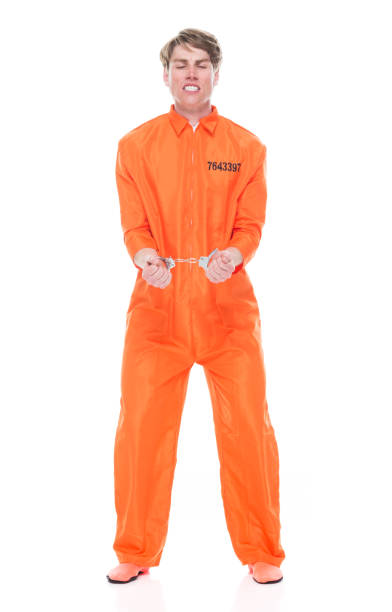 istock Male prisoner wearing handcuffs 1149437068