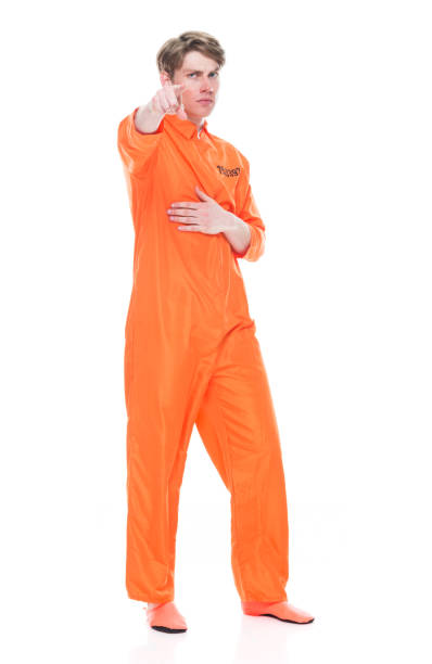 istock Male prisoner wearing orange jumpsuit 1149437704