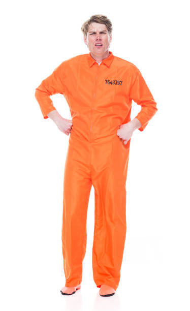 istock Male prisoner wearing orange jumpsuit 1149442229