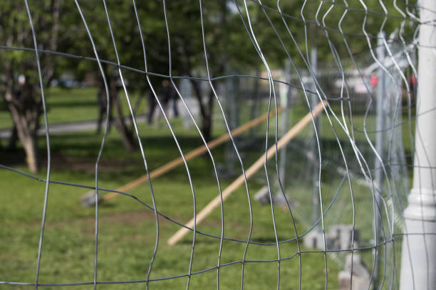 istock Big metal fence in a park 1149450988