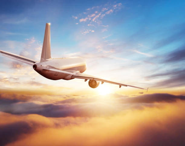 istock Passengers commercial airplane flying above clouds 1149452790
