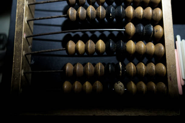 istock Obsolete wooden abacus, black background 1149457213