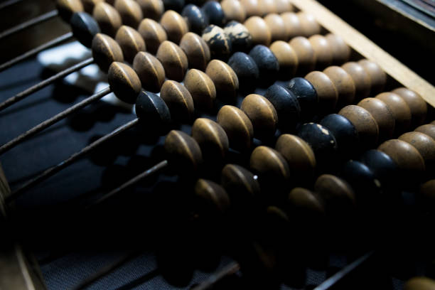 istock Obsolete wooden abacus, black background 1149457217