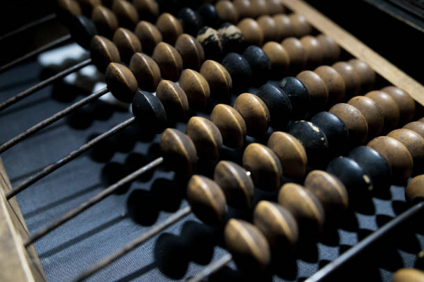 istock Obsolete wooden abacus, black background 1149457225