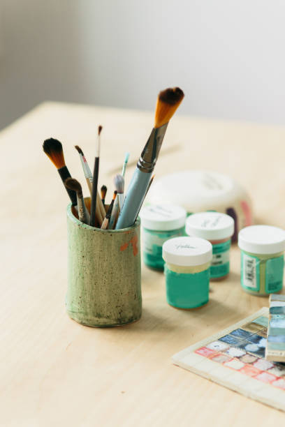 istock drawing tools in a ceramic glass on a wooden table 1149457359