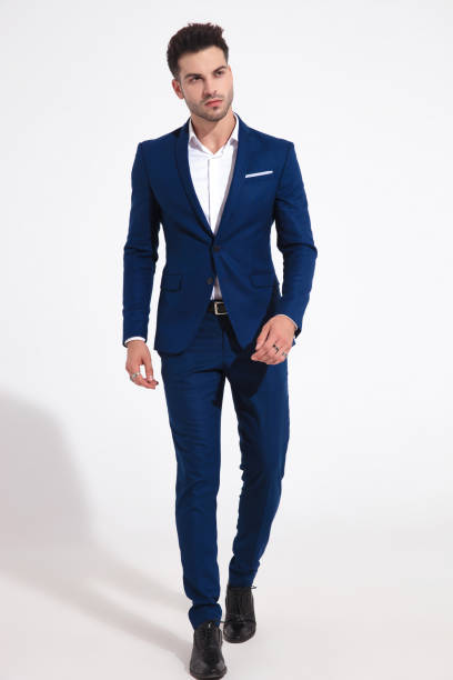 istock Serious looking man walking forward and staring to the side 1149457748