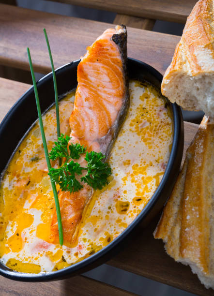 istock Creamy salmon soup with baguette 1149460482