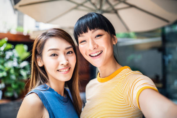 istock Two young women taking a selfie 1149461769