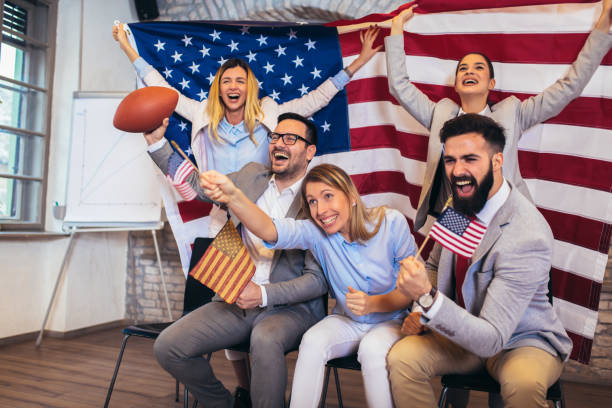 istock Friends cheering sport league together 1149462857