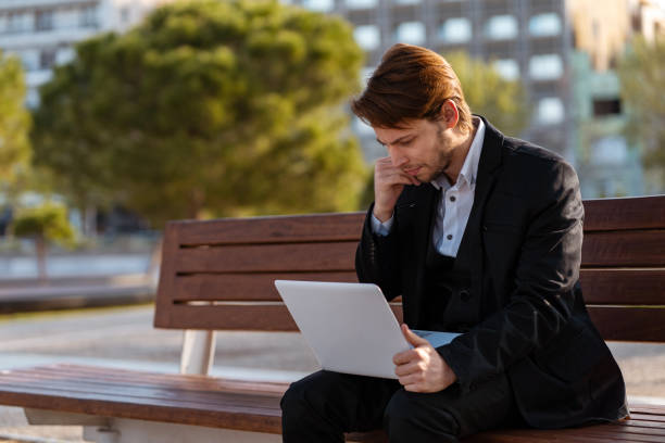 istock Businessman working outdoors 1149462937