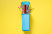 Containers for separate collection garbage with plastic straw. Top view. Save planet.