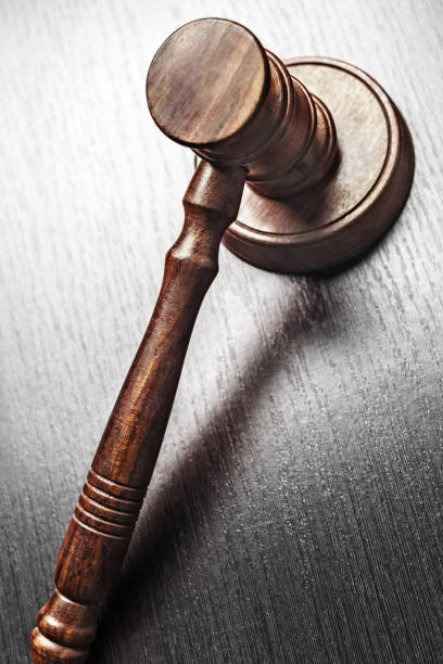 Judge's Gavel over black background