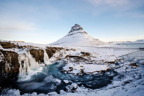 istock Waterfall and the Kirkjufell behind 1149469758