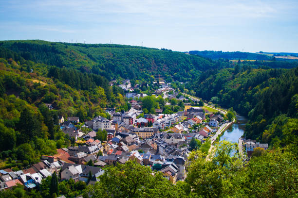 View of the village and valley of Vianden, with mountains and forest, and the Our river crossing, in Luxembourg, Europe View of the village and valley of Vianden, with mountains and forest, and the Our river crossing, in Luxembourg, Europe vianden stock pictures, royalty-free photos & images