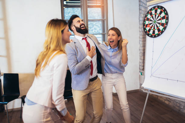istock Business people play darts 1149471628