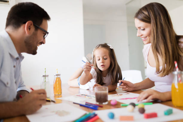istock Happy family having fun time at home 1149473393