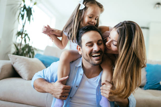 istock Happy family having fun time at home 1149473421