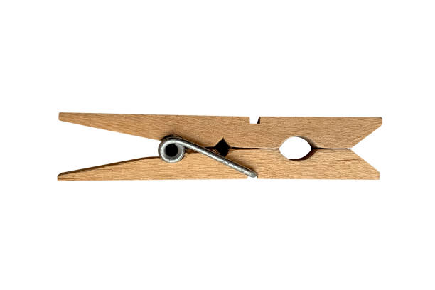 istock wooden clothespin for drying clothes isolated on white background 1149474348