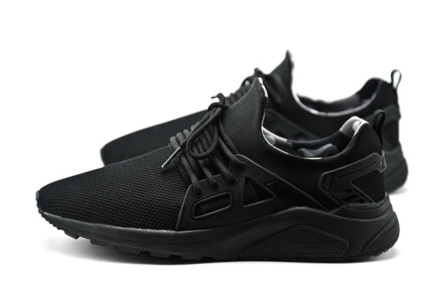 istock Sport shoes on white background 1149476765