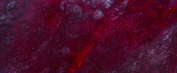 istock abstract red pink glittering paint background 1149477595