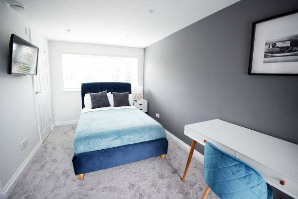 istock Interior of a house, bedroom, looking towards bed 1149478264