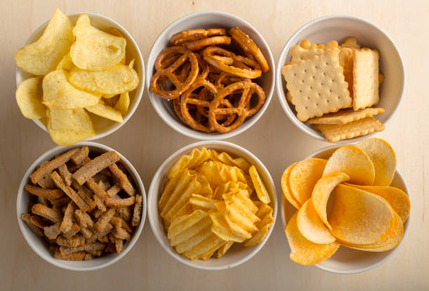 istock Pretzels in bowls on wooden table from above 1149478459