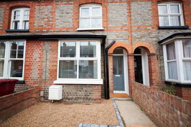 istock Front elevation and front garden of a small terraced house 1149478890