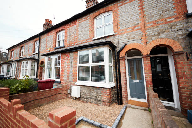 Entrance and front garden of a small terraced house Entrance and front garden of a small terraced house bay window stock pictures, royalty-free photos & images