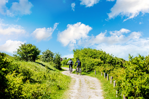 mountain biker doing a hike in the paths