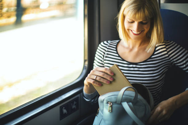 istock I have my book, travel can begin. 1149488644