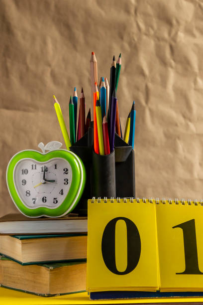istock Back to school concept. Stack of books with school supplies 1149490886
