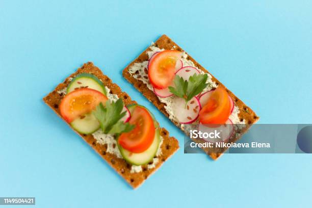 Delicious Summer Sandwiches With Cottage Cheese With Greens And Vegetables On A Blue Background Stock Photo - Download Image Now