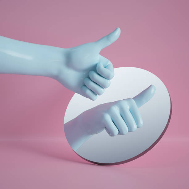 istock 3d render, hand reflection in round mirror isolated on pink background, abstract conceptual composition, like gesture, thumb up, mannequin body part 1149518404
