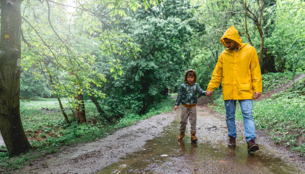istock Father and son hiking in nature 1149524952