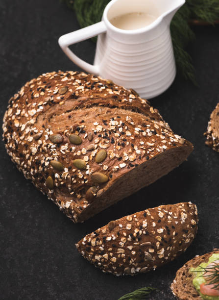 istock bread wholegrain with milk on dark background 1149525200