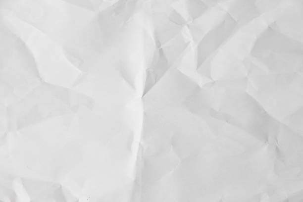 istock White creased paper background 1149528700