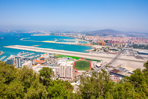 View of the airport from the top of the rock of Gibraltar on the bay