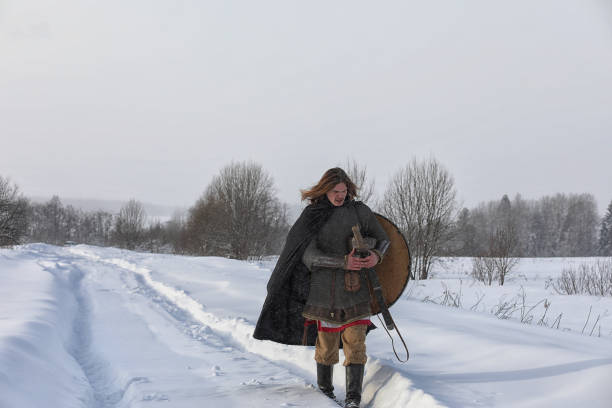 istock Defender the young warrior in mail armor 1149538639