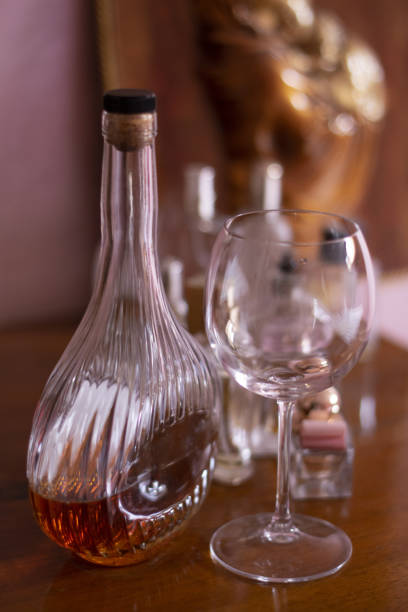 istock cognac bottle and wineglass 1149542551