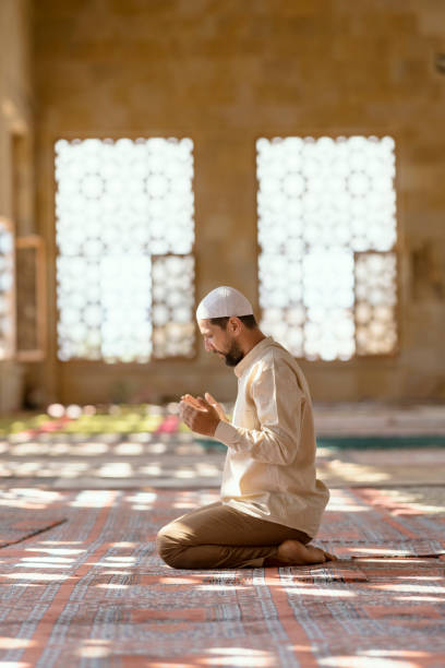 istock Muslim man is praying in mosque 1149543127